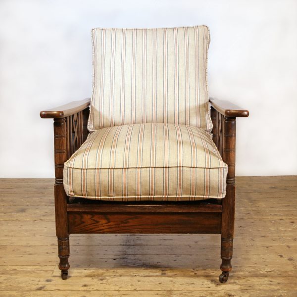 An Oak Reclining Armchair by James Shoolbred & Company London