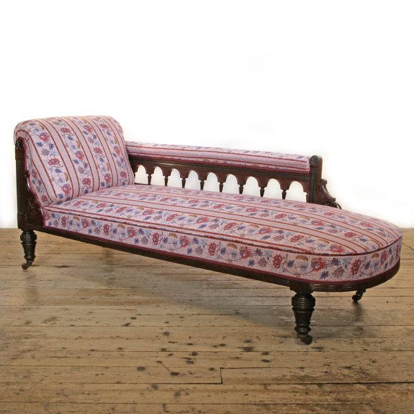 An Aesthetic Movement Chaise Longue possibly by Lamb of Manchester upholstered in Quenin fabric