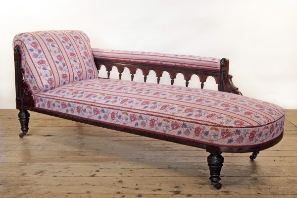 An Aesthetic Movement Chaise Longue possibly by Lamb of Manchester upholstered in Quenin fabric