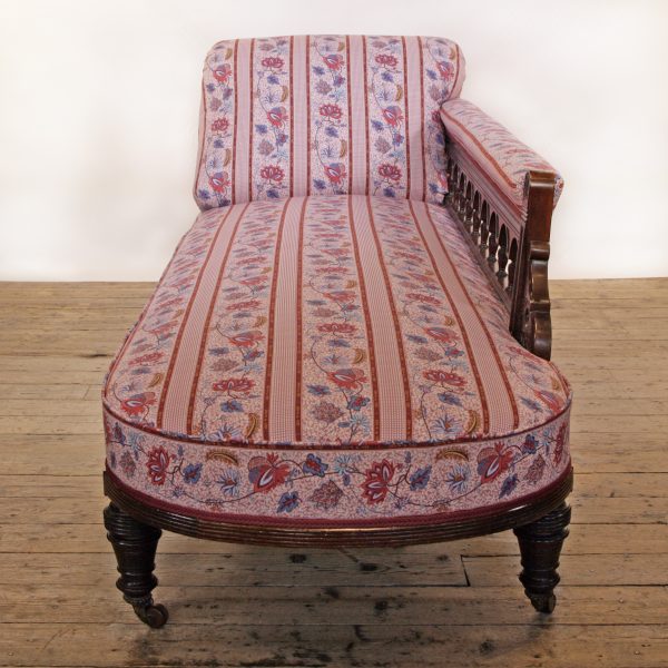 An Aesthetic Movement Chaise Longue possibly by Lamb of Manchester upholstered in Quenin fabric