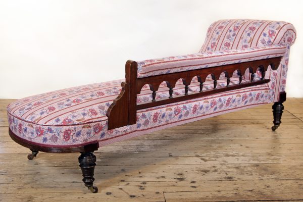 An Aesthetic Movement Chaise Longue possibly by Lamb of Manchester upholstered in Quenin fabric