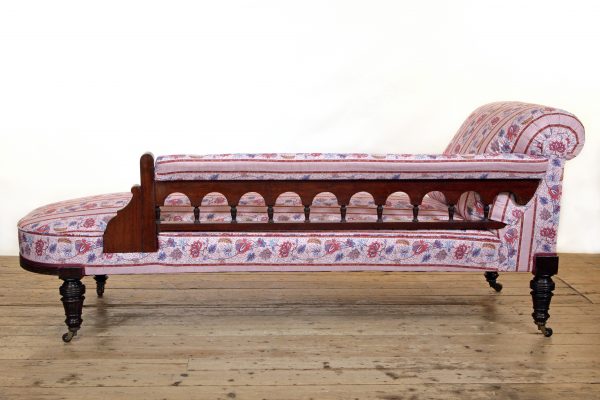 An Aesthetic Movement Chaise Longue possibly by Lamb of Manchester upholstered in Quenin fabric
