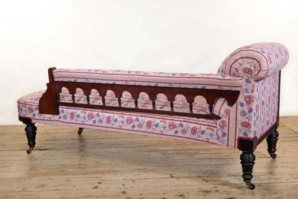 An Aesthetic Movement Chaise Longue possibly by Lamb of Manchester upholstered in Quenin fabric