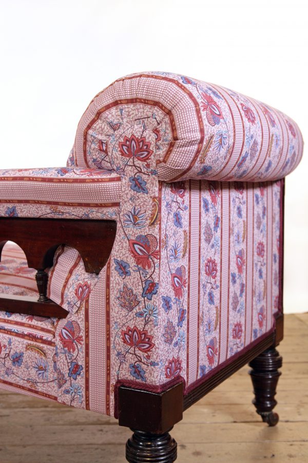 An Aesthetic Movement Chaise Longue possibly by Lamb of Manchester upholstered in Quenin fabric