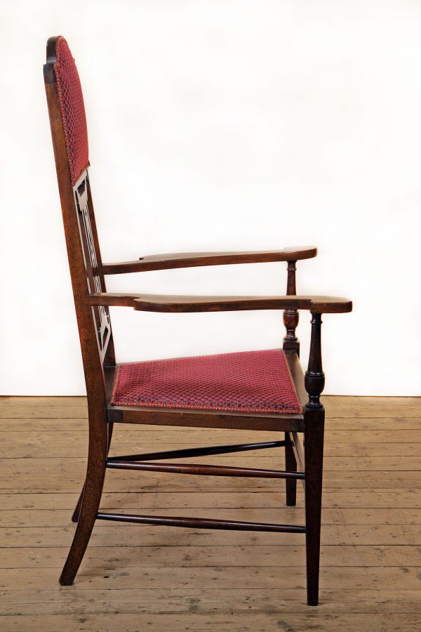 An impressive Art Nouveau, inlaid, mahogany armchair