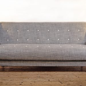 An Elegant Mid-Century, hand-buttoned, folding Sofa