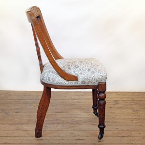 An Oak side chair in Lewis and Wood linen